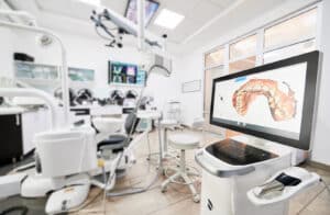 Dental office showing advanced 3D dental imaging software and equipment